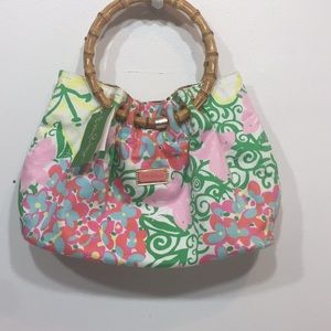 NWT  Dress to impress clutch  Mariposa print